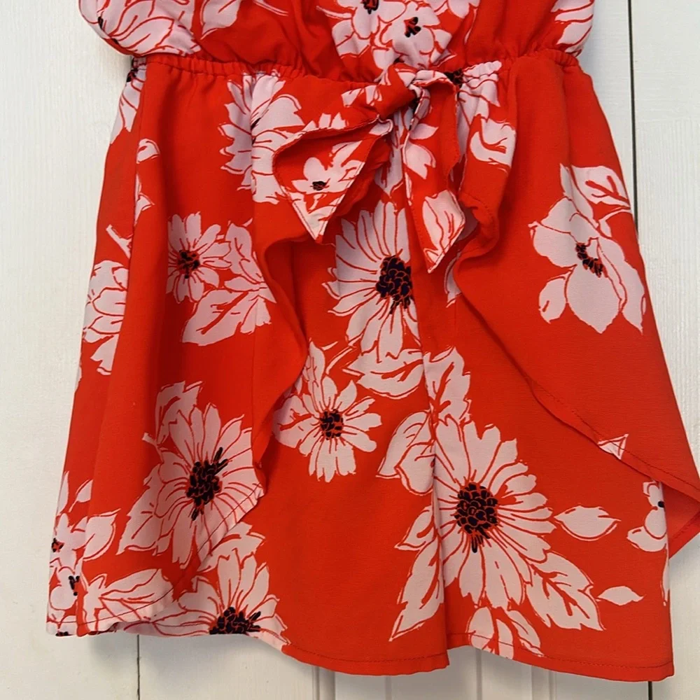 My Michelle girls floral romper orang & white one button bow in back. si…